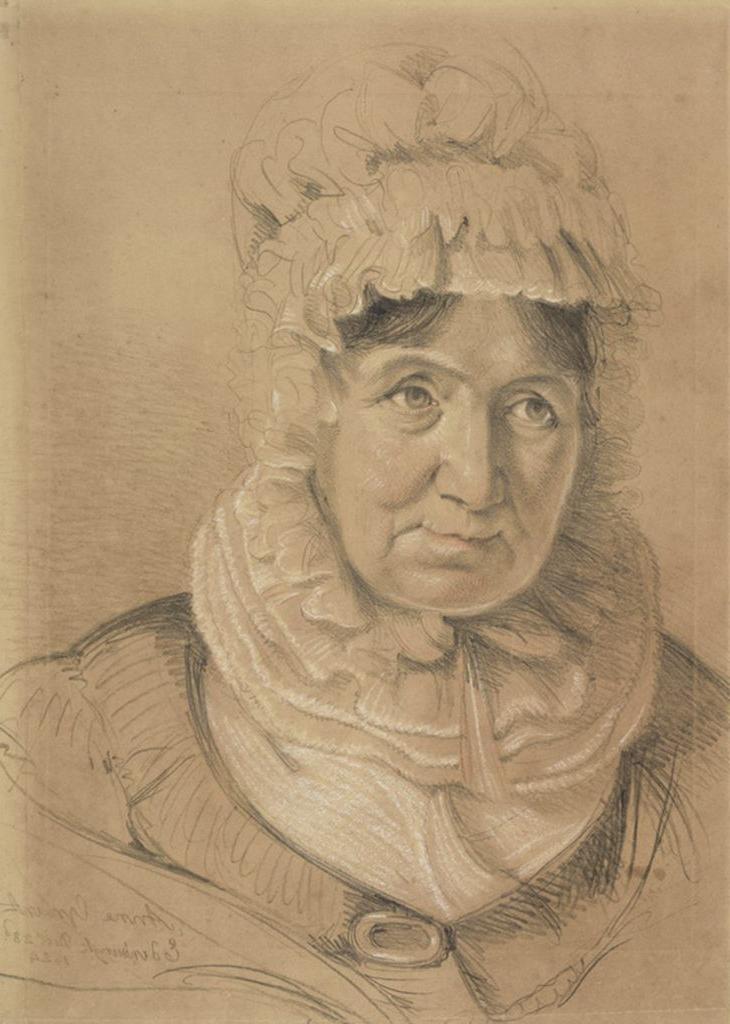 A 69-year-old white woman with dark hair is sketched in white and black chalk on paper. She wears a white bonnet, a white ruffled collar, and a black shawl with an oval fastener.