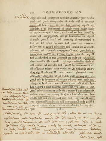 A color photograph of a book page with words in black ink printed text with lighter more brown ink underlining, and notes, especially in the lower half of the page. 